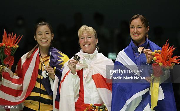 Mew Choo Wong of Malaysia, Tracey Jayne Hallam of England and Susan Hughes of Scotland pose for a picture during the medal ceremony for the women's...
