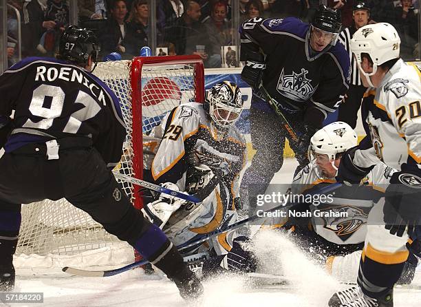 Jeremy Roenick of the Los Angeles Kings puts a shot on goal against Tomas Vokoun of the Nashville Predators on March 25, 2006 at the Staples Center...