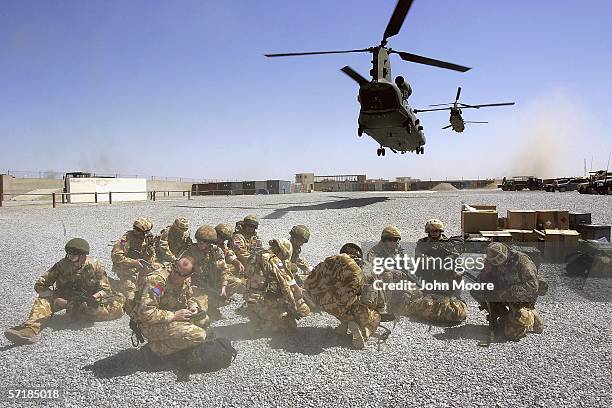 The first regular British troops of the Helmand Task Force arrive by helicopter to an American-run base on March 26, 2006 in Lashkar Gah, in the...