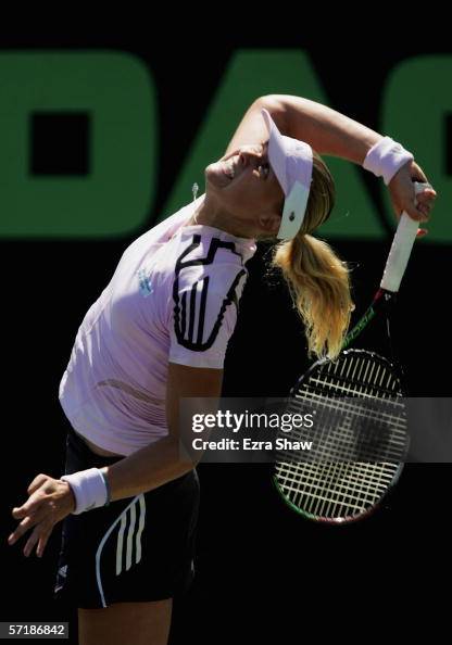 AnnaLena Groenefeld of Germany serves to Jie Zheng of China during