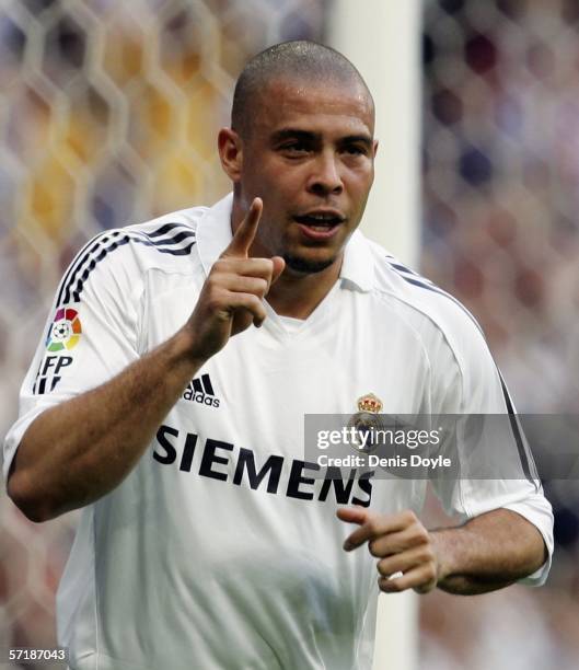 Ronaldo of Real Madrid celebrates after scoring his team's second goal during a Primera Liga match between Real Madrid and Deportivo La Coruna at the...