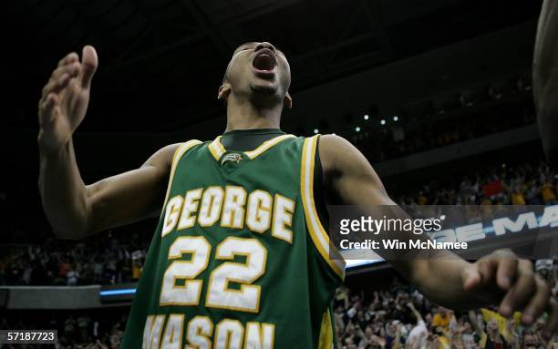 Lamar Butler of the George Mason Patriots celebrate their victory over the Connecticut Huskies during the Regional Finals of the NCAA Men's...