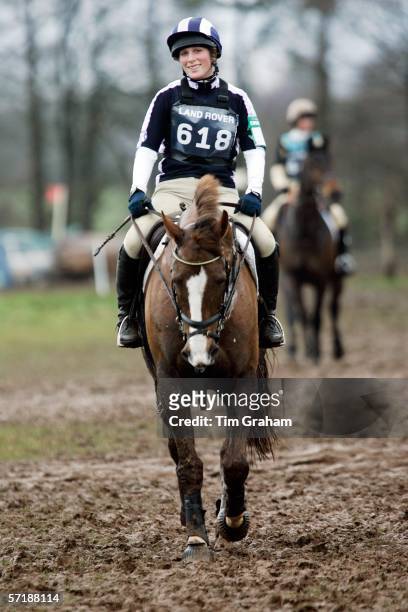 Zara Phillips smiling with relief as she completes the muddy cross country section of the British Eventing Gatcombe Horse Trials on March 26, 2006 at...