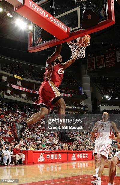 LeBron James of the Cleveland Cavaliers dunks against the Houston Rockets March 26, 2006 at the Toyota Center in Houston, Texas. NOTE TO USER: User...