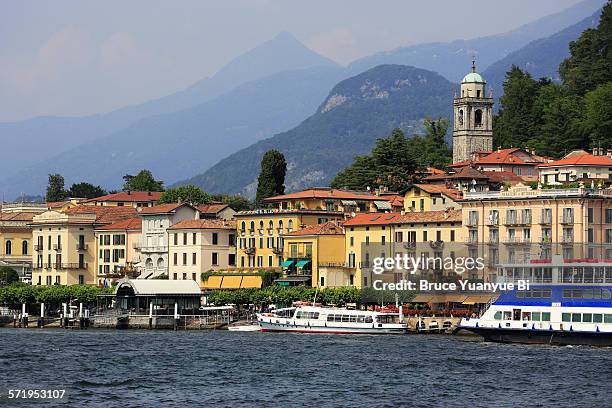 view of bellagio with tower of san giacomo church - bellagio stockfoto's en -beelden