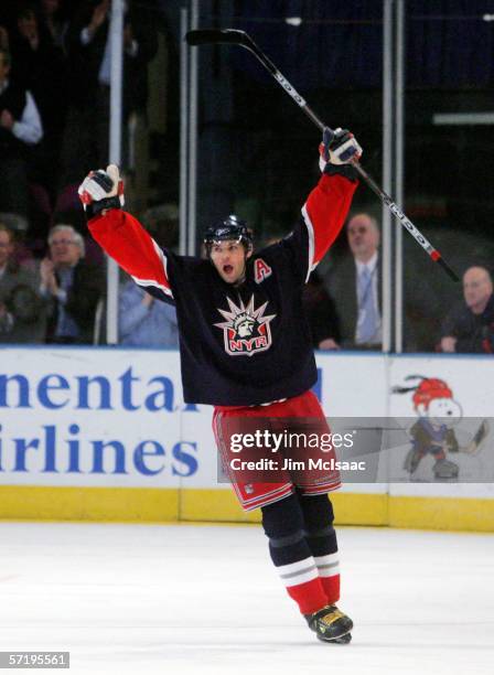 Jaromir Jagr of the New York Rangers celebrates after scoring his 52nd goal of the season to tie the team record for goals in a season during their...