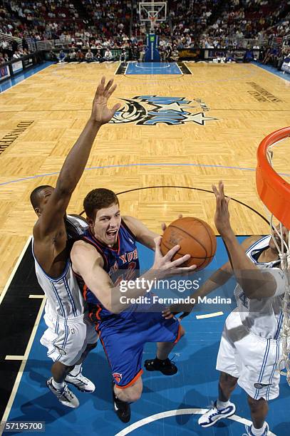David Lee of the New York Knicks takes the ball to the basket against the Orlando during a game at TD Waterhouse Centre on March 22, 2006 in Orlando,...