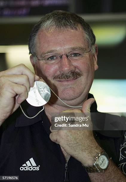 Silver medalist in the shooting Greg Yelavich arrives home with the New Zealand athletes from the Commonwealth Games at Auckland International...