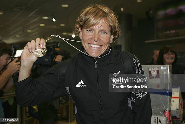 Silver medalist in the womens triathlon Sam Warriner arrives home with the New Zealand athletes from the Commonwealth Games at Auckland International...