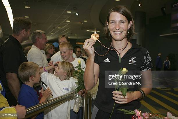 Bronze medalist in the womens swimming relay Alison Finch arrives home with the New Zealand athletes from the Commonwealth Games at Auckland...