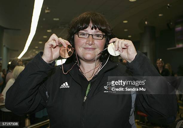 Bronze and Silver medalist in the shooting Juliet Etherington with her medal upon her arrival with the New Zealand athletes from the Commonwealth...