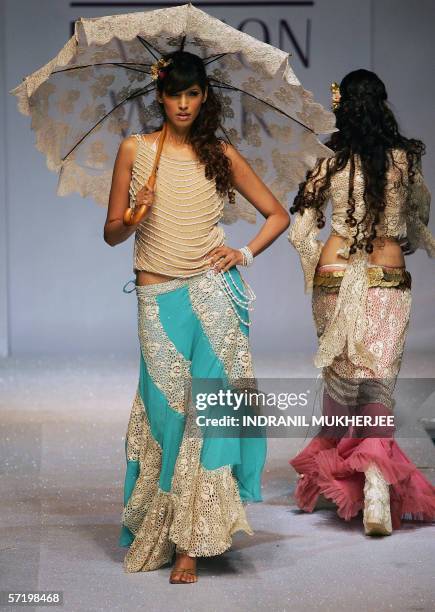 Model displays a creation by designer Surily Goel on the first day of the inaugural Lakme Fashion Week in Mumbai, 28 March 2006. The first of two...