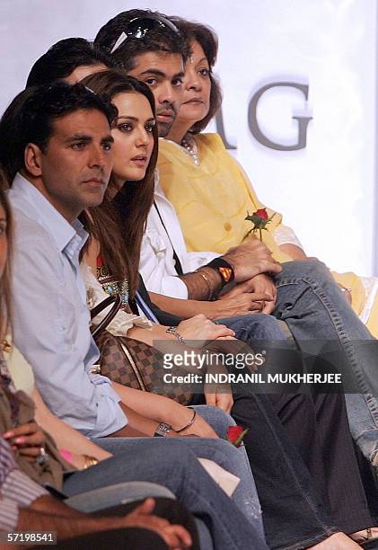 Indian Bollywood celebrities Akshay Kumar , Priety Zinta and Karan Zohar attend a show by designer Surily Goel on the first day of the inaugural...