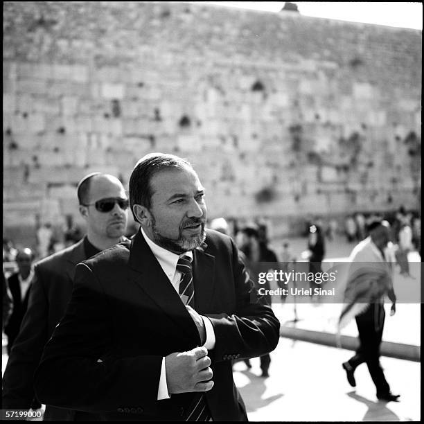 Right-wing Israeli politician Avigdor Lieberman, head of the Yisrael Beiteinu party, leaves after praying at the Western Wall, Judaism's holiest...