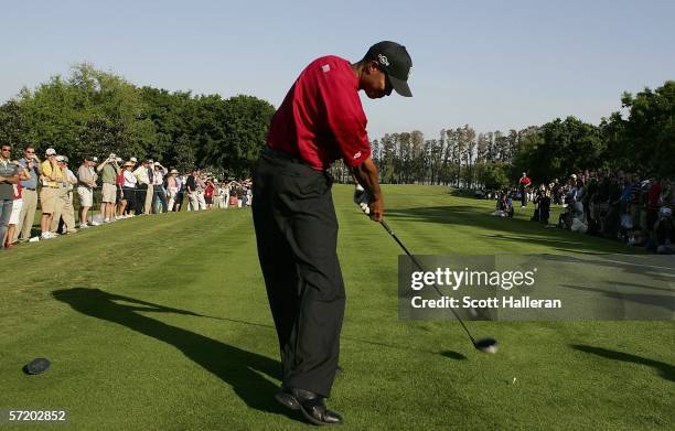 Tiger Woods hits his tee shot on the 17th hole during the second day of the Tavistock Cup at the Isleworth Golf and Country Club on March 28, 2006 in...