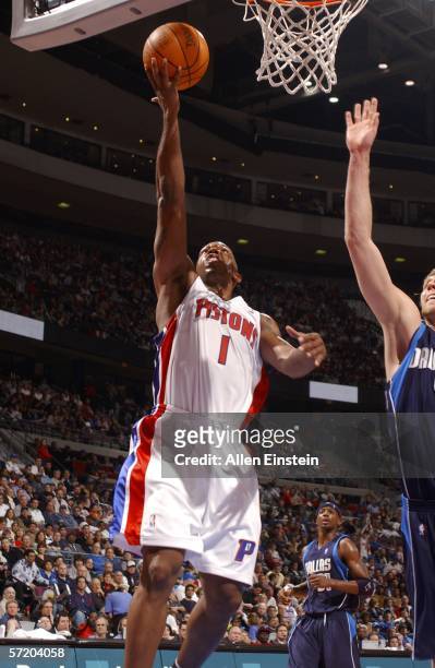 Chauncey Billups of the Detroit Pistons shoots a layup against Dirk Nowitzki of the Dallas Mavericks at the Palace of Auburn Hills on March 28, 2006...
