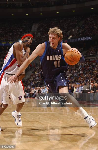 Dirk Nowitzki of the Dallas Mavericks drives against Richard Hamilton of the Detroit Pistons at the Palace of Auburn Hills on March 28, 2006 in...