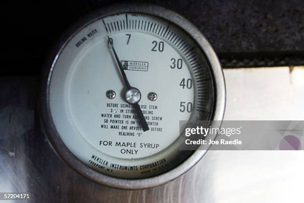Gauge shows how hot the boiling maple syrup is in the evaporator inside the maple syrup shed March 28, 2006 in Bowdoin, Maine. Penny Savage and Earle...