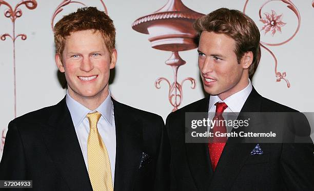 Waxwork models of Prince Harry and Prince William are seen together as Harrys model is unveiled as the latest installation at London tourist...