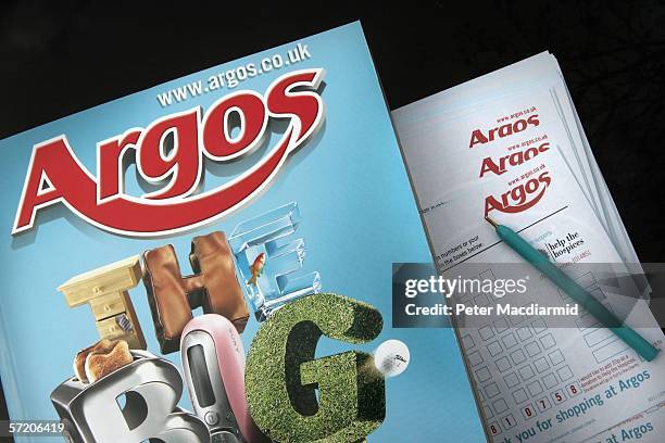 In this photo illustration an Argos catalogue and purchase slips are displayed at a branch near Byfleet on March 29, 2006 in Surrey, England. Parent...