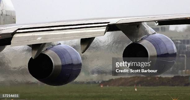 Exhaust emits from the engines of a passenger jet as it prepares for take off at Heathrow Airport on March 30, 2006 in London, England. Air travel is...
