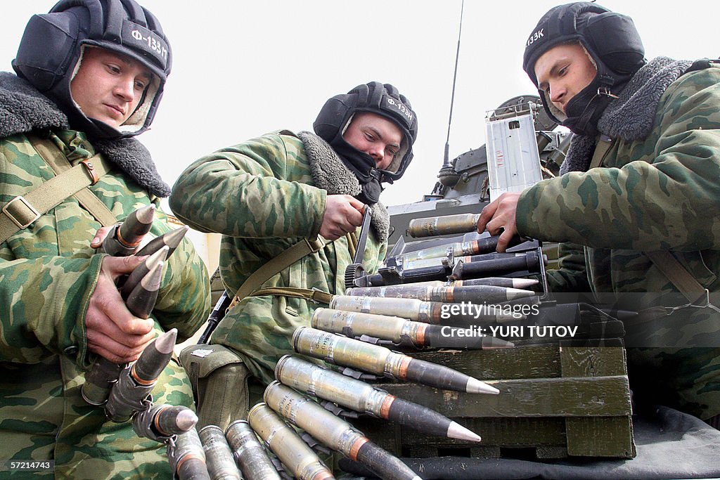 Soldiers of Russian Interior troops load