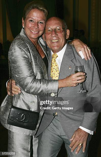 Sir Stirling Moss and his wife Susie attend the official welcome for the Australian Formula One Grand Prix at Government house on March 30, 2006 in...
