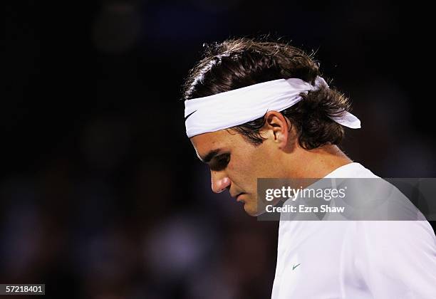 Roger Federer of Switzerland walks back to the baseline during the uarterfinals match against James Blake at the Nasdaq-100 Open at the Tennis Center...