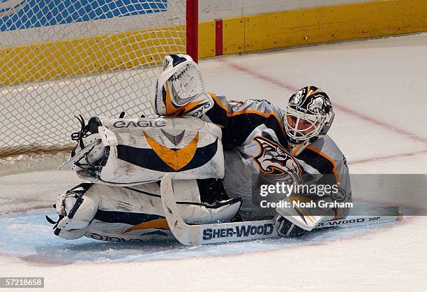 Goaltender Tomas Vokoun of the Nashville Predators stacks the leg pads for the save against the Los Angeles Kings during their game on March 25, 2006...