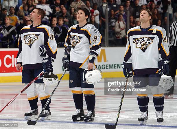 Mike Sillinger, Paul Kariya and Kimmon Timonen of the Nashville Predators line up at the blueline prior to their game against the Los Angeles Kings...