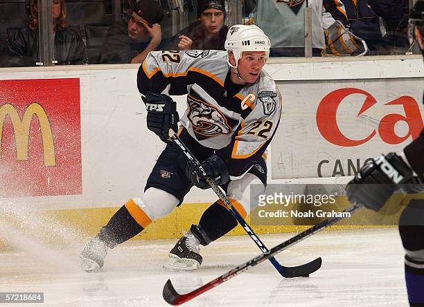 Greg Johnson of the Nashville Predators stops as he looks to make a play with the puck against the Los Angeles Kings during their game on March 25,...