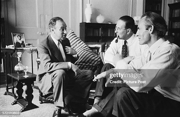 Writer and broadcaster Edgar Lustgarten , chairman Kenneth Adam and producer John Irwin planning their topical discussion programme, 'Free Speech',...