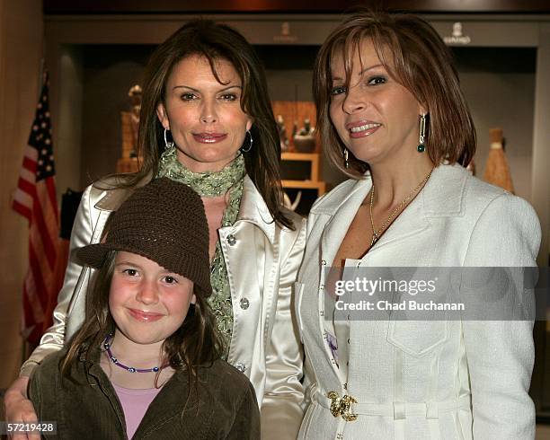 Actress Roma Downey and daughter Riley pose with CEO of Lladro Safa S. Hummel at the unveiling of a new Lladro sculpture benefiting Opertation Smile...