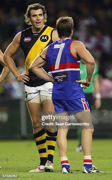 Matthew Richardson for the Tigers disputes a decision with Scott West for the Bulldogs during the round one AFL match between the Western Bulldogs...