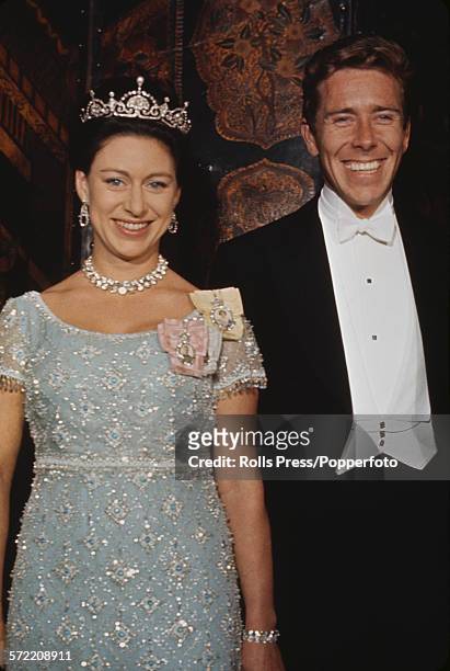 Princess Margaret, Countess of Snowdon pictured wearing a tiara and ornate necklace with her husband Antony Armstrong-Jones, 1st Earl of Snowdon at...