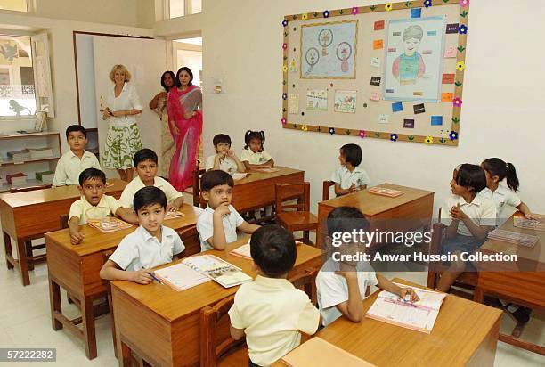 Camilla, Duchess of Cornwall joins a class at the Montessori Palace School in Jaipur on the final day of a 12 day official tour visiting Egypt, Saudi...