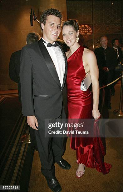 Patrick Murphy and swimmer Giaan Rooney pose on the red carpet during the Australian Formula One Grand Prix Ball at the Crown Palladium Ballroom on...