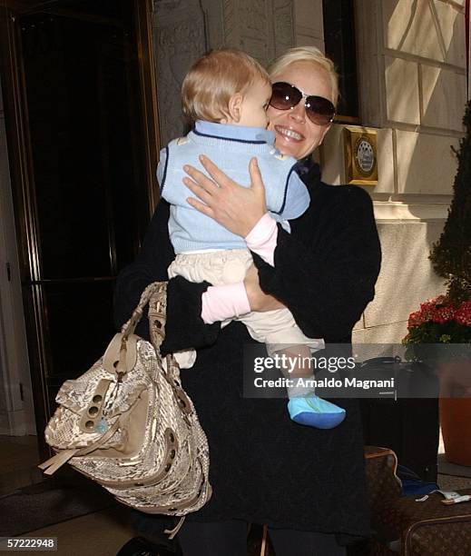 Sharon Stone holds her adopted baby Laird Vonne Stone as she leaves a midtown hotel March 31, 2006 in New York City.