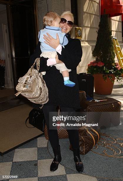 Sharon Stone holds her adopted baby Laird Vonne Stone as she leaves a midtown hotel March 31, 2006 in New York City.
