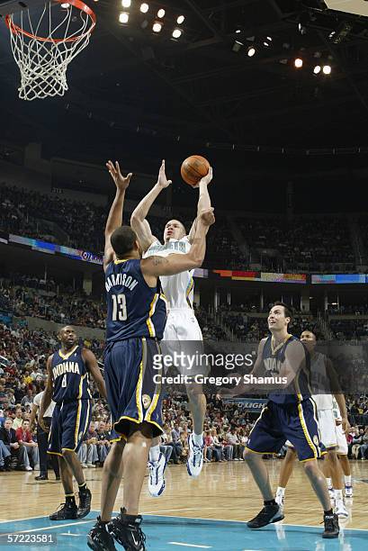 Aaron Williams of the New Orleans/Oklahoma City Hornets shoots against David Harrison of the Indiana Pacers on March 10, 2006 at the Ford Center in...