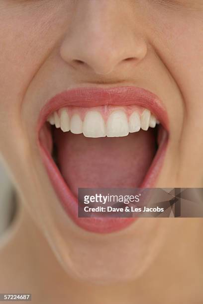 young woman's shouting face - woman mouth stock pictures, royalty-free photos & images