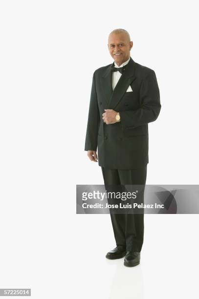 full view portrait of man in tuxedo - dinner jacket stock pictures, royalty-free photos & images