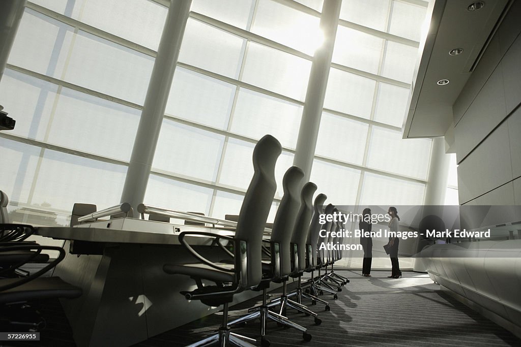 Businesswomen talking in conference room