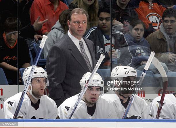 Head coach Michel Therrien of the Pittsburgh Penguins looks on as his team plays the New York Islanders at the Nassau Coliseum on March 31, 2006 in...