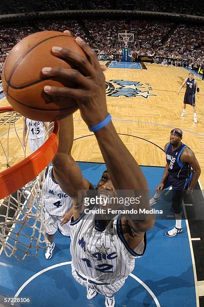 Dwight Howard of the Orlando Magic dunks against the Dallas Mavericks on March 31, 2006 at TD Waterhouse Centre in Orlando, Florida. The Magic...
