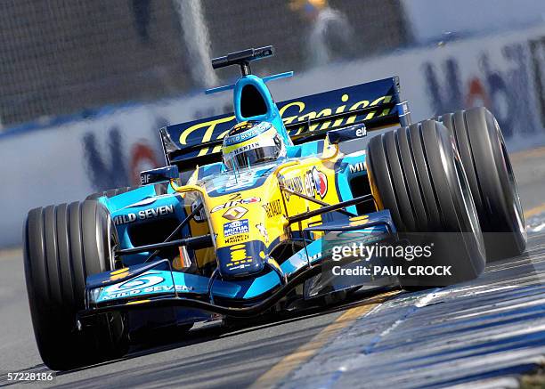 Giancarlo Fisichella of Italy runs his Renault wide onto the ripple strip during the qualifying session of the Australian Formula One Grand Prix in...