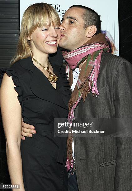 Coco Iverson and director Elliott Lester arrive at the "Love Is The Drug" Industry Screening at the Academy of Television Arts and Sciences on March...