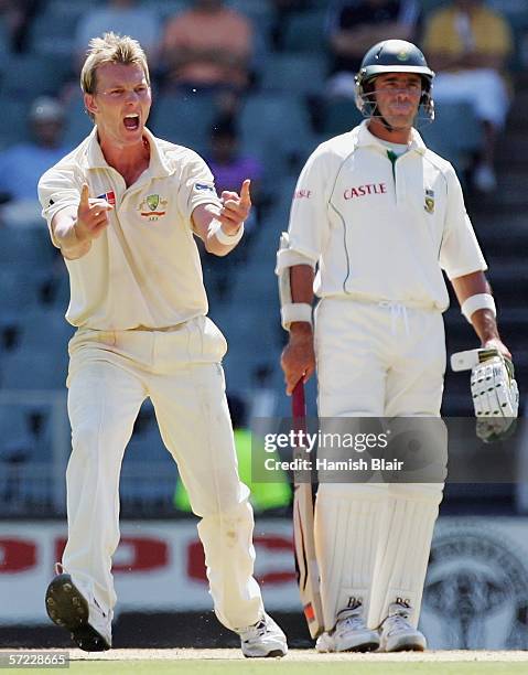 Brett Lee of Australia celebrates the wicket of Ashwell Prince of South Africa with non striker Nicky Boje looking on during day two of the Third...