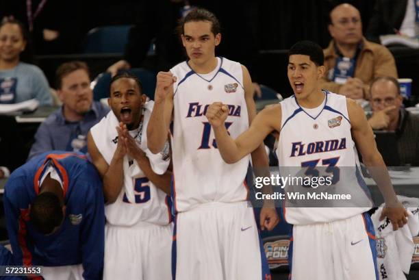 Joakim Noah, Jimmie Sutton and David Huertas and the Florida Gators react during the final seconds before defeating the George Mason Patriots 73-58...