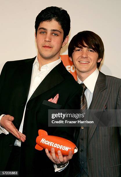 Actors Josh Peck and Drake Bell of the show "Drake & Josh" pose with their award for "Favorite TV Show" in the press room during the 19th Annual...